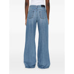 Back view of Seven Jeans Blue wide-leg denim jeans with logo patch, belt loops, and two rear pockets.
