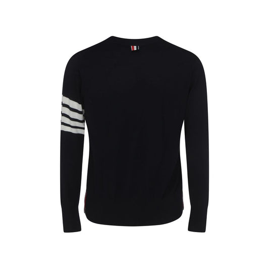 Back view of Thom Browne Cardigan with iconic logo bands and striped cuffs, made from fleece wool, showcasing AW25 design.