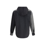Back view of Thom Browne Hooded Shirt Jacket with asymmetrical hem, showing drawstring hood and buttoned cuffs.