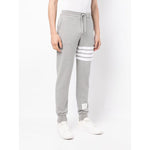Thom Browne Trousers Grey - cotton sweatpants with 4-Bar stripe, drawstring waist, and grosgrain loop tab.