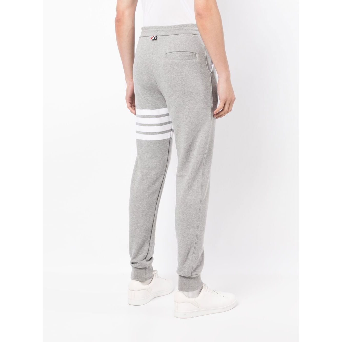 Rear view of Thom Browne Trousers Grey with 4-Bar stripe, grosgrain loop tab, and drawstring waist