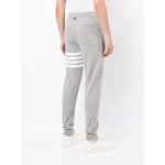 Rear view of Thom Browne Trousers Grey with 4-Bar stripe, grosgrain loop tab, and drawstring waist