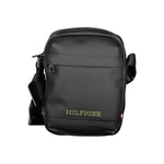 Tommy Hilfiger Black Polyethylene Shoulder Bag with adjustable strap, external and internal pockets, and zip closure.