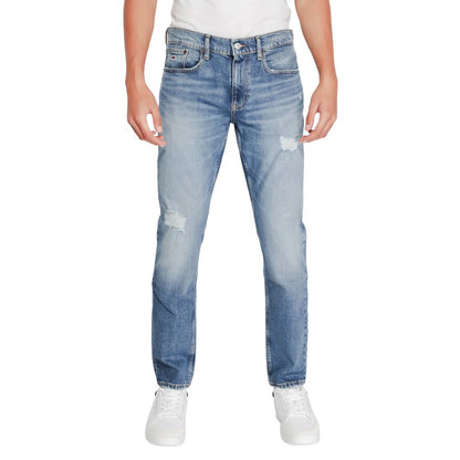 Tommy Hilfiger Jeans Blue Cotton Slim Fit Jeans for men showing the front view with tapered legs and distressed details.