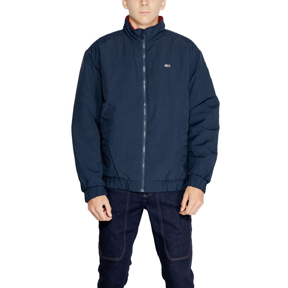 Man wearing Tommy Hilfiger Jeans Blue Polyamide Bomber with padded insulation.