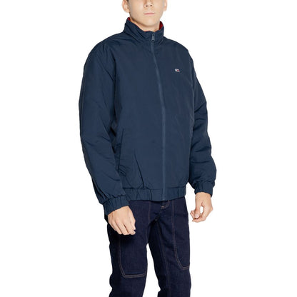 Tommy Hilfiger Jeans Blue Polyamide Bomber on model showcasing padded jacket with zip closure and high collar.