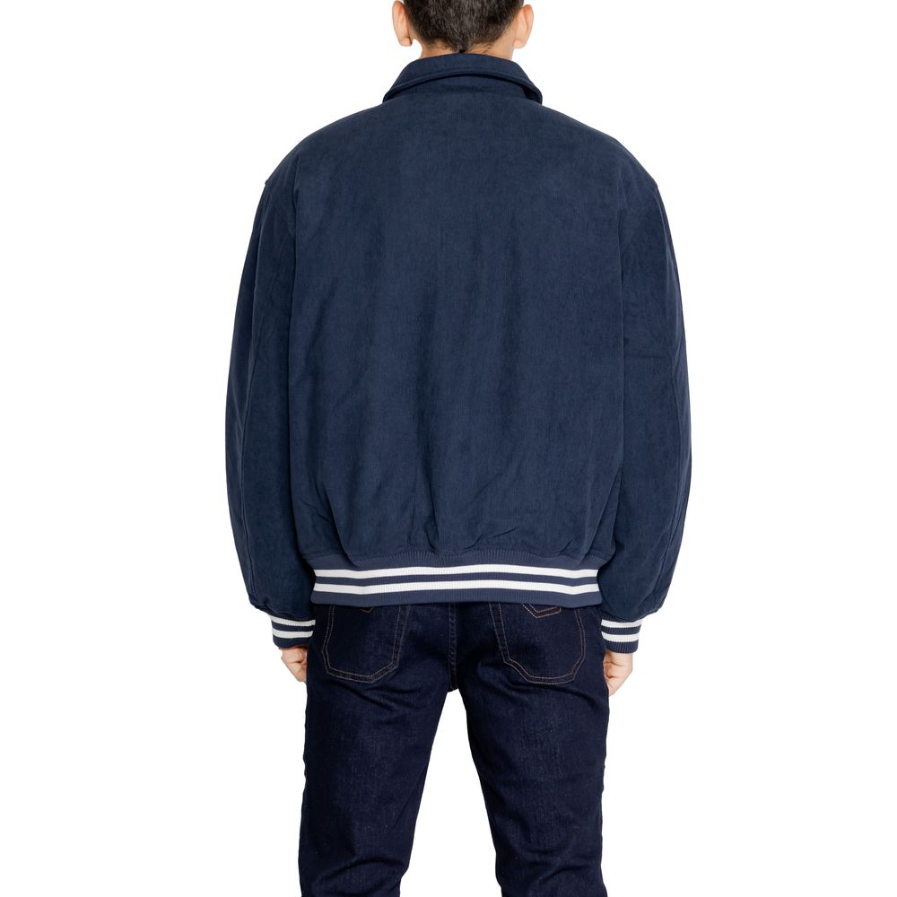 Rear view of man wearing Tommy Hilfiger Jeans Blue Recycled Polyester Jackets And Coat with ribbed cuffs.