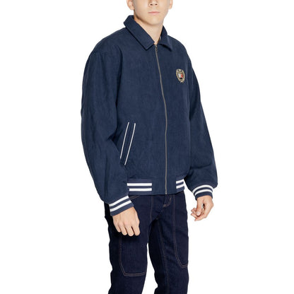 Tommy Hilfiger Jeans Blue Recycled Polyester Jackets And Coat featuring a crest emblem and classic style.