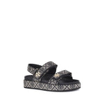 Tory Burch Kira Sandals in jacquard with Monogram T, featuring Velcro straps, rubber sole, and logo embellishments for casual style.