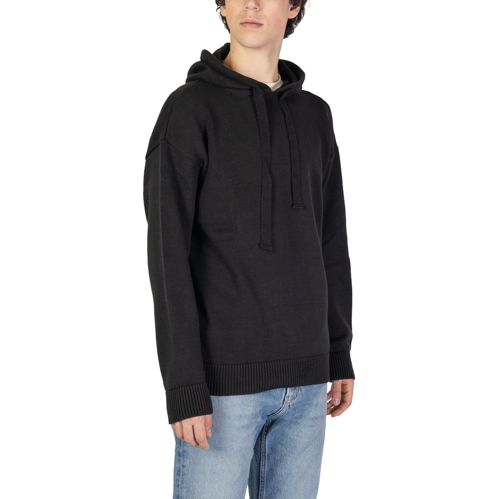 Underclub Black Cotton Sweater with hood, worn by model. Modern casual knitwear for men, featuring soft cotton blend, regular fit, and ribbed cuffs.