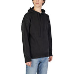 Underclub Black Cotton Sweater with hood, worn by model. Modern casual knitwear for men, featuring soft cotton blend, regular fit, and ribbed cuffs.