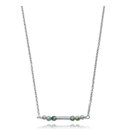 Silver necklace with delicate green beads on a minimalist chain, featuring a modern design perfect for elegant and casual wear.