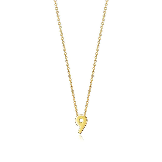 Gold necklace with a pendant in the shape of the number 9, displayed on a white background, showcasing elegant jewelry design.