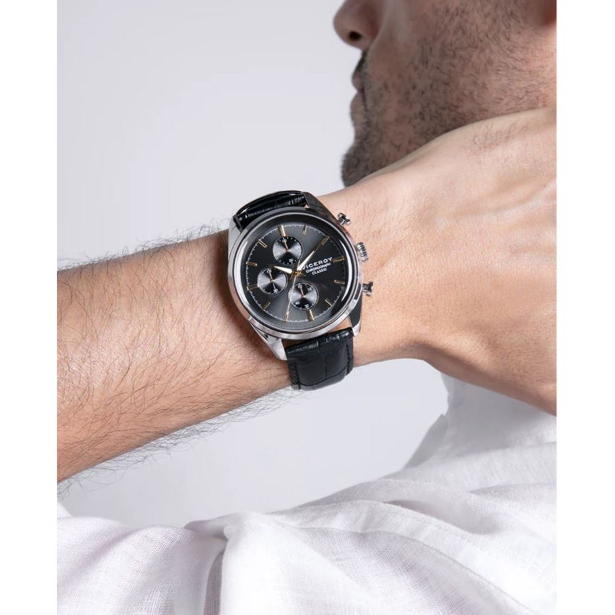 Gent wearing VICEROY Mod. 401379-17 watch, 42mm quartz chronograph, silver 925° material, black leather strap, water resistant 10 ATM
