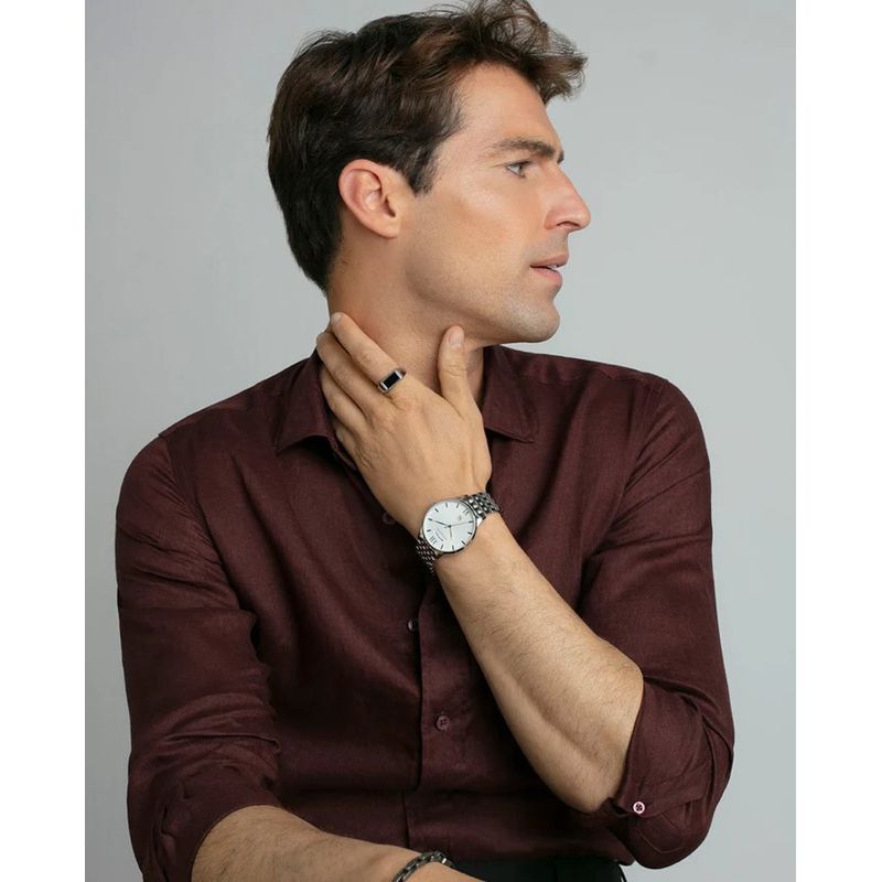 Gent wearing VICEROY Mod. 42455-83 watch with brown shirt, showcasing elegant design and mineral dial, quartz movement, water-resistant 5 ATM.