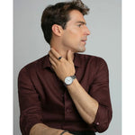 Gent wearing VICEROY Mod. 42455-83 watch with brown shirt, showcasing elegant design and mineral dial, quartz movement, water-resistant 5 ATM.