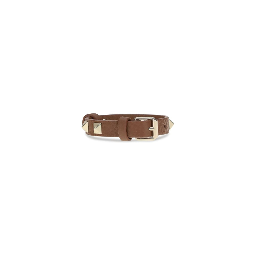 Valentino Garavani Brown Metal Bracelet with iconic Rockstud design, leather finish, and adjustable buckle closure, AW25 collection.