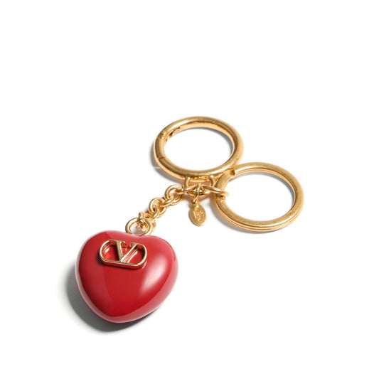Valentino Garavani Coeur Royal key ring, red heart-shaped charm with logo, polished finish, gold keyring attachment, 13 cm length, 3.5 cm width.