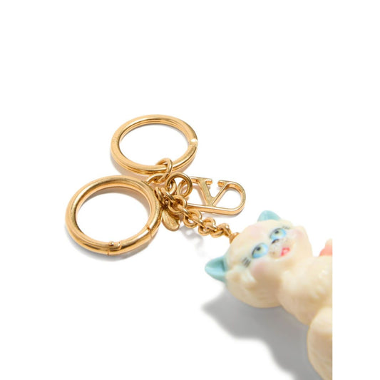 Valentino Garavani Le Chat De La Maison Nylon Bag Charm with Keychain featuring light beige cat charm and V logo keyring detail.