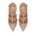 Valentino Garavani Rockstud Décolleté With 100mm Straps in powder pink leather featuring gold-tone studs and 100mm stiletto heels.
