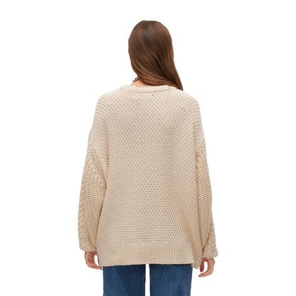 Back view of Vero Moda Beige Cotton Sweatshirt with cable-knit pattern, showing relaxed fit and oversized sleeves.