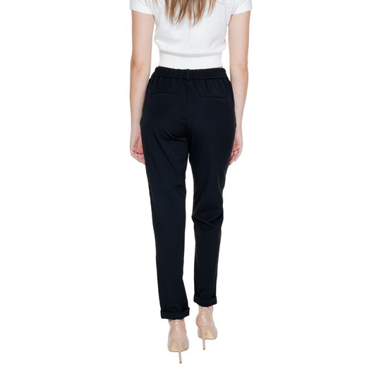 Back view of woman wearing Vero Moda Black Polyester Pant, regular fit, spring/summer collection.