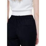 Back view of Vero Moda Black Polyester Pant, women's regular pants, spring/summer collection, featuring elastic waistband for comfort.