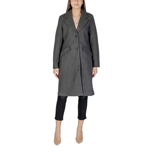 Woman wearing Vero Moda Gray Polyester Coat with lapel collar and two-button closure, showcasing sustainable fashion for contemporary style.