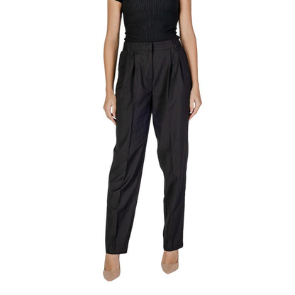 Woman wearing Vila Clothes Black Polyester Casual Pants with front pleats, high waist, and zip closure, offering comfort and style.