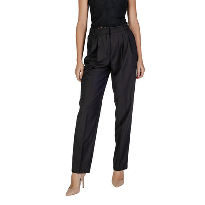Woman wearing Vila Clothes Black Polyester Casual Pants with high waist and front pleats, showcasing comfort and style.