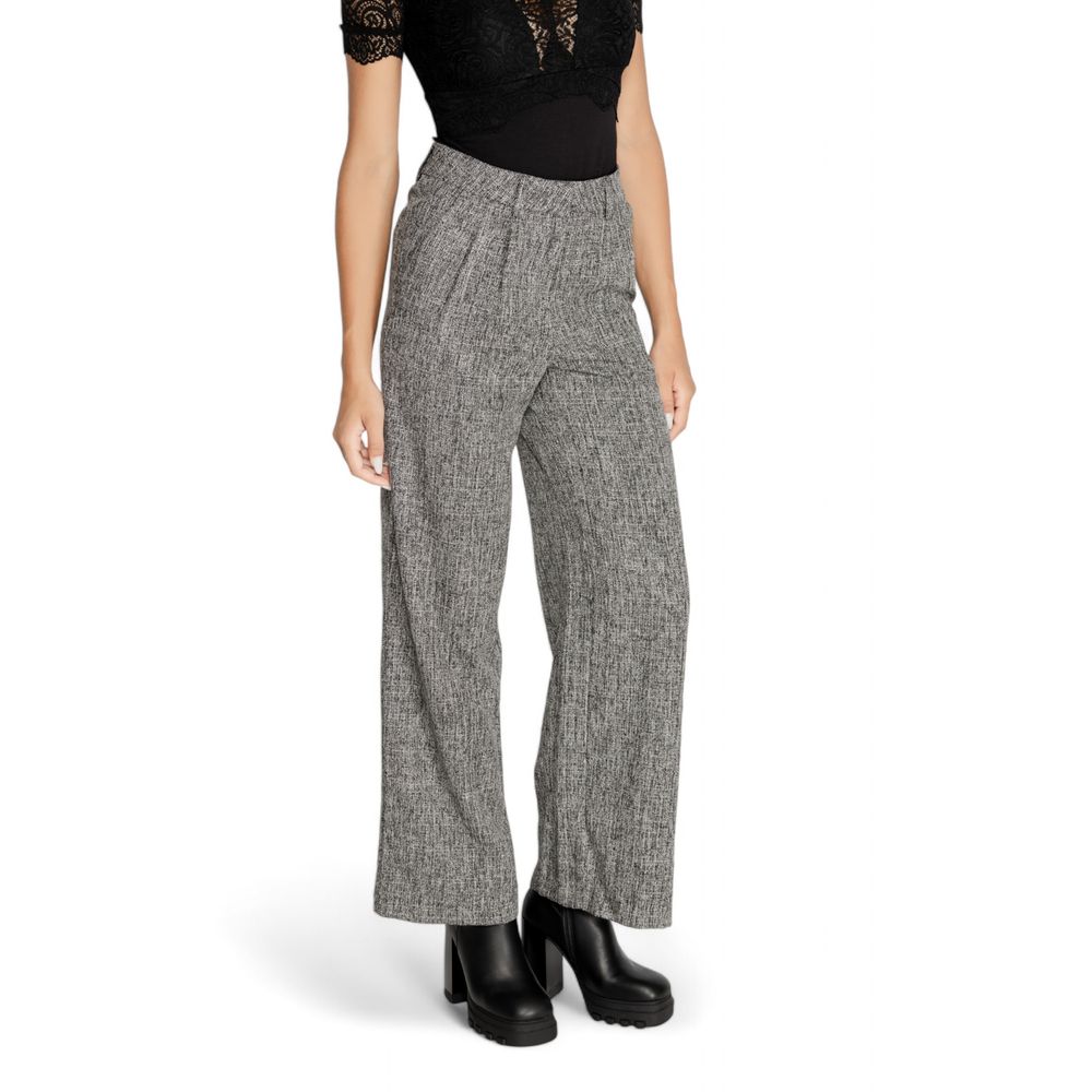 Woman wearing Vila Clothes Black Recycled Polyester Pant with wide leg tailored design, high waist fit, and elegant style.