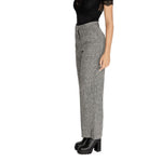 Side view of Vila Clothes Black Recycled Polyester Pant with high waist and wide leg design, enhancing a contemporary silhouette.