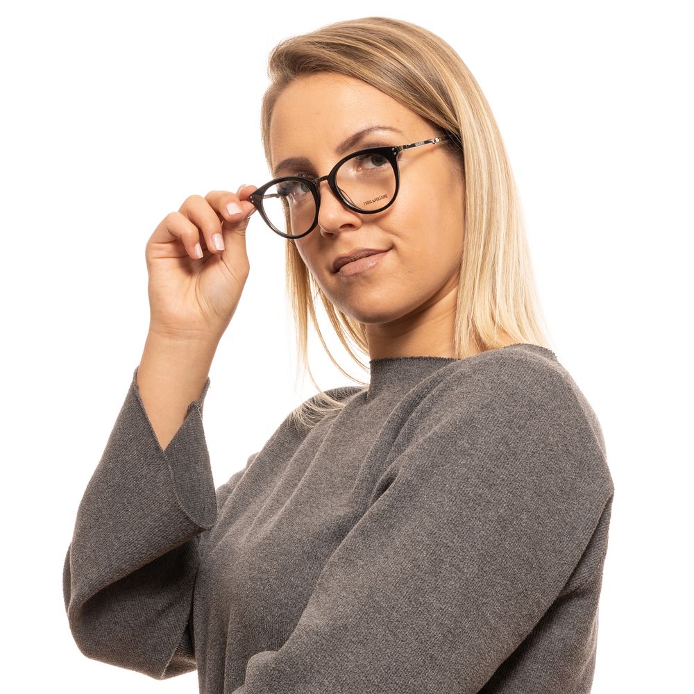 Woman wearing Zadig & Voltaire Chic Round Full-Rim Unisex Designer Glasses in a sophisticated setting.