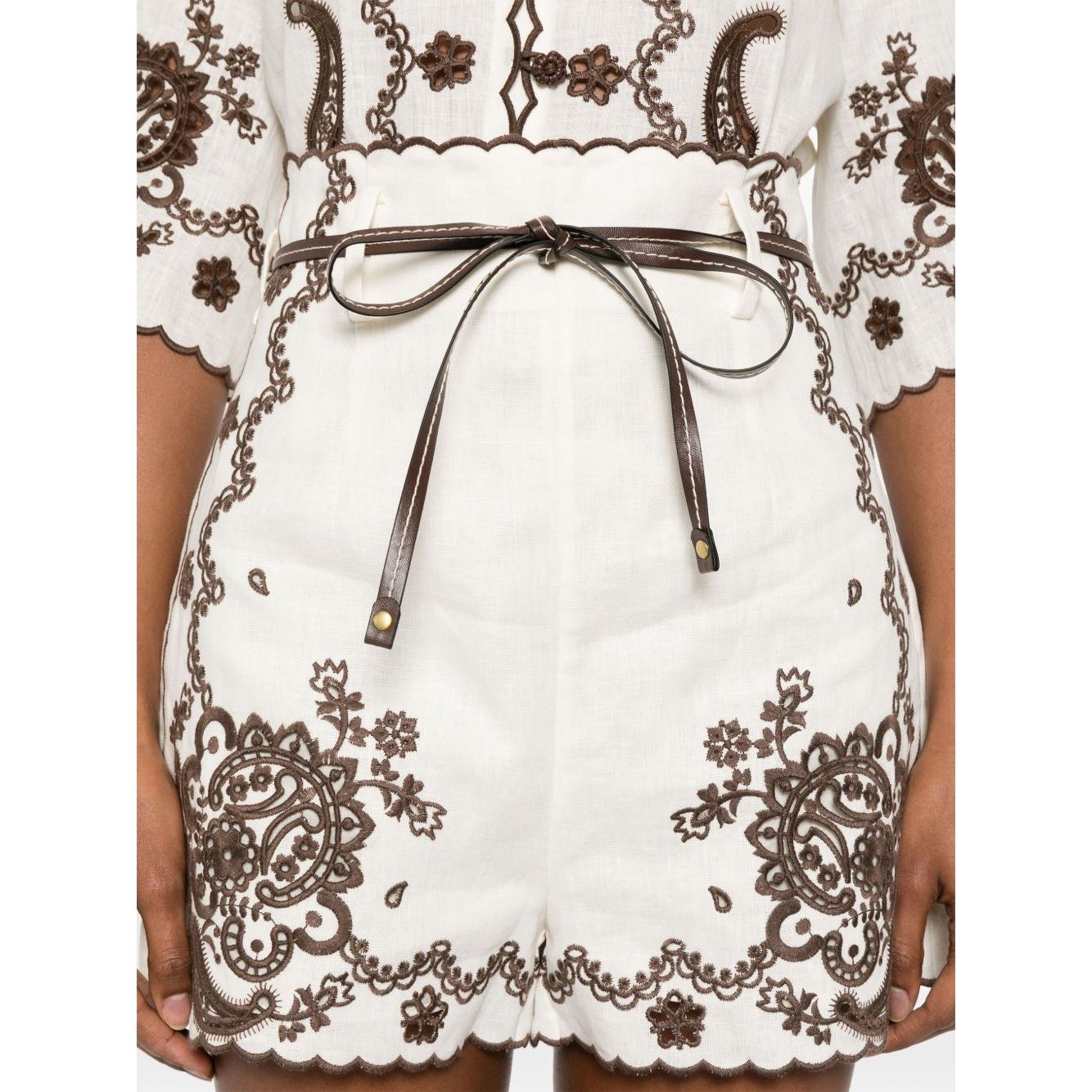 Zimmermann Ascension Shorts in light beige with scallop edge, embroidered design, detachable belt, and concealed rear zip fastening.