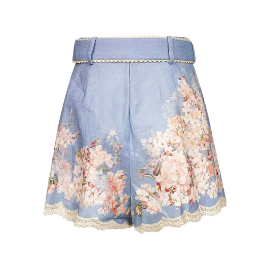 Zimmermann Floral-print belted shorts in blue with lace trim and botanical design, featuring detachable belt and high waist style.