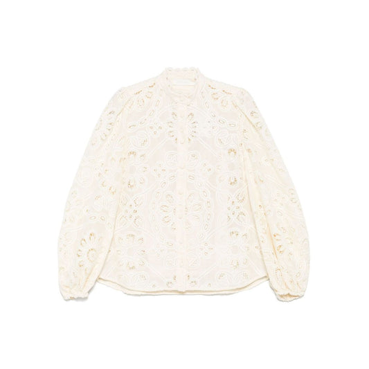 Zimmermann Shirts Ivory Rhiannon embroidered blouse with beige button fastening, cut-out floral detailing, and long elasticated cuff sleeves.